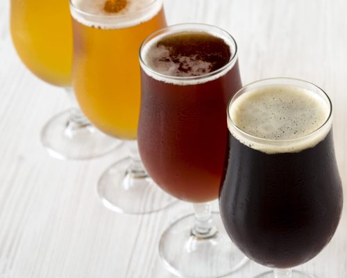 Assorted beers, side view. Close-up.
