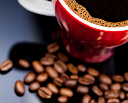 hot-coffee-in-a-red-mug-with-beans-2026-03-26-00-50-52-utc